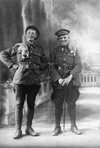 Photo of two men standing together in military uniforms
