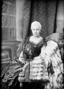 Black and white photo of a seated woman