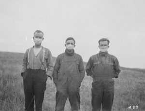 Albertan men wearing masks during the influenza epidemic, 1918.