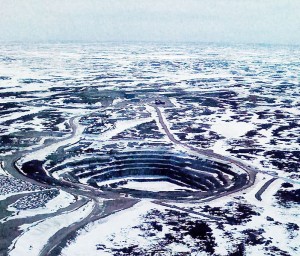 Aerial view of a snowy mining pit