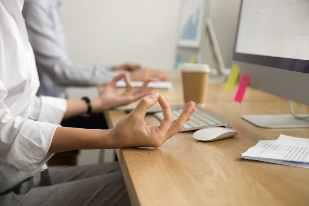 student practicing mindful qualities through meditation