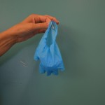 Discard used non-sterile gloves