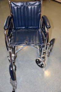 Wheelchair with one leg rest removed