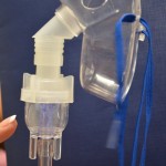 Tap the nebulizer container