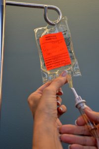 Insert spike into secondary IV bag