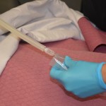 Use aseptic technique to attach suction catheter to suction tubing