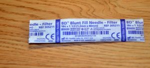 Blunt fill needle with filter