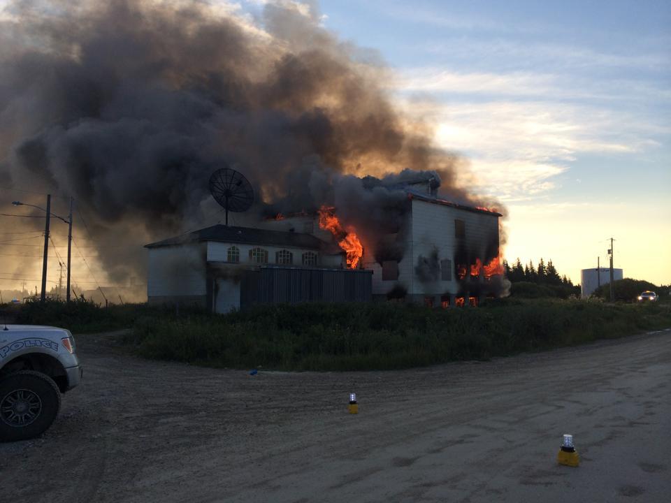 Photo of a burning building.