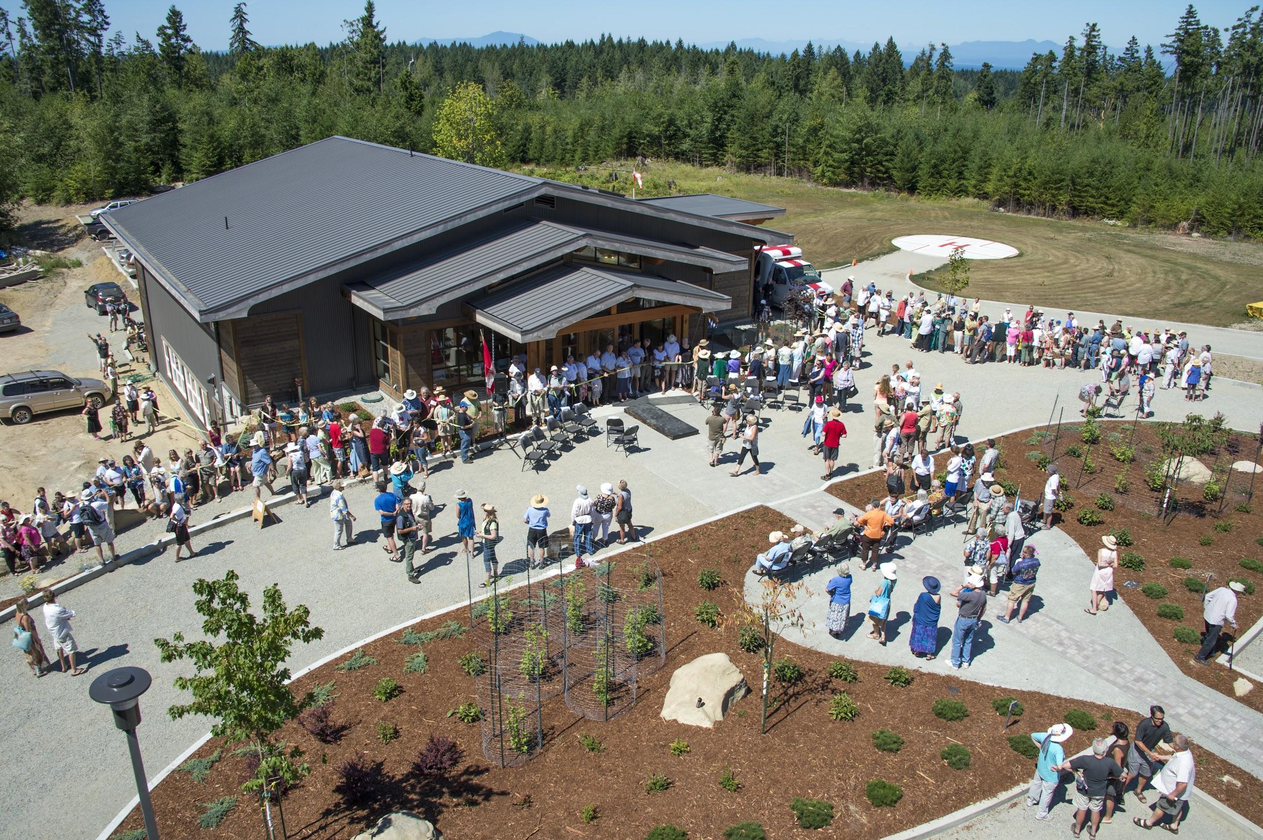 aerial view of the Gabriola Island medical clinic with many people standing around outside
