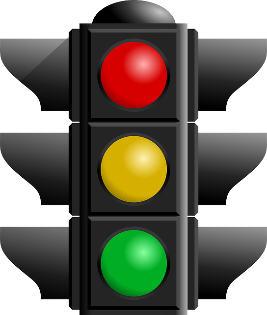 image of a traffic light with green on the bottom, yellow at the centre, and red at the top