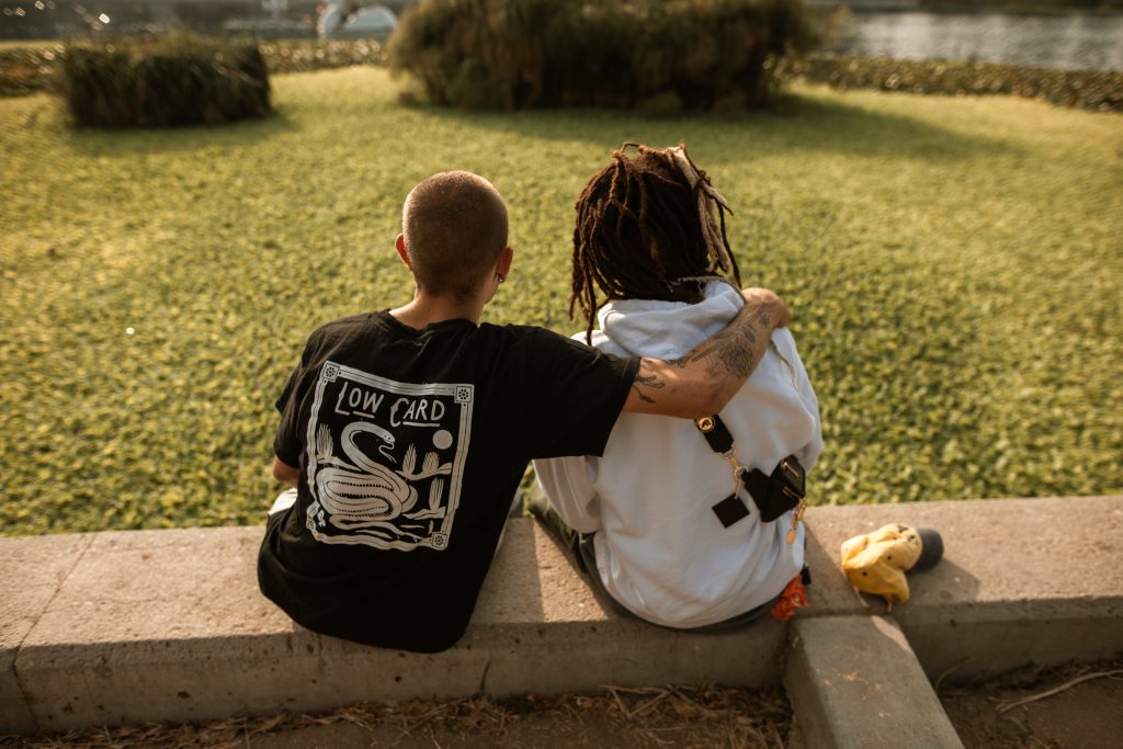 Friends Sitting at a Park