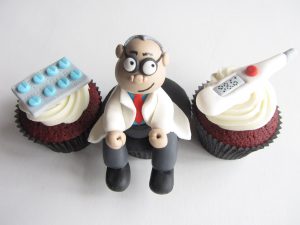 Cupcakes decorated with pills, thermometer