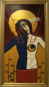 Painting of Jesus in blue, yellow, red and white segments, with a golden disk behind his head and his arms outstretched, looking directly at the viewers. The background is red and yellow, and plants decorate the bottom of the painting. Four red strings connect from his chest to the top of the painting.