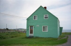 Image of house painted the colour green