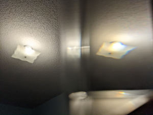 A lamp seen twice in the same photo