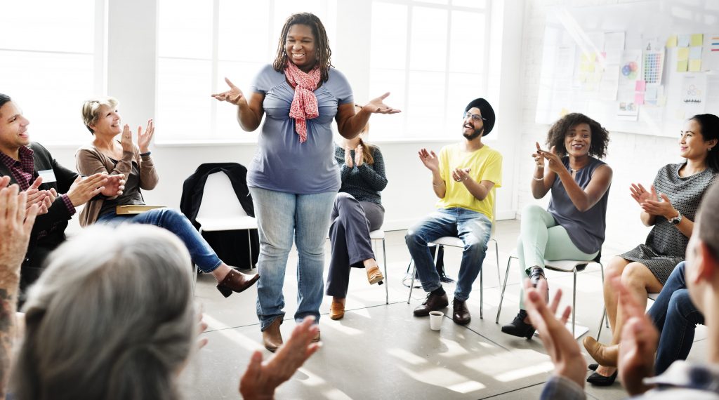 Diverse group of people having a discussion