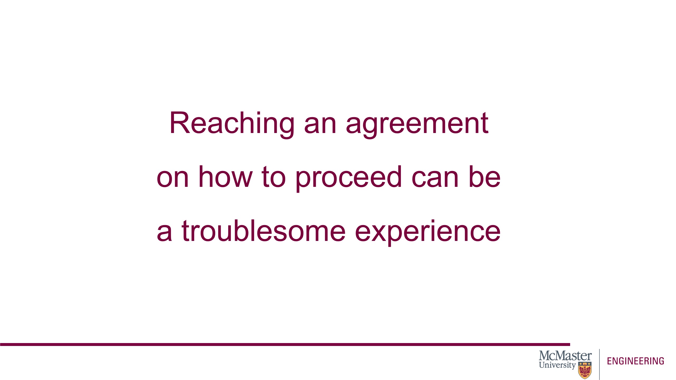 Image of a presentation slide. Slide says, "Reaching an agreement on how to proceed can be a troublesome experience."