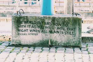 Street Art - cement block with a quote on it.