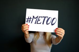 Person holding #MeToo sign.