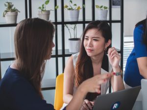 One person listening while another talks.