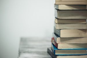 Stack of books on a table.