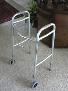 A photo of a walker: an assistive device required for recovery from hip fracture repair.