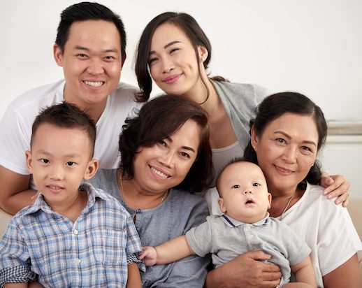 Happy Asian Family Posing Together