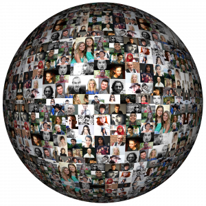 hundreds of faces from different cultures on globe