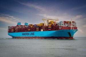 Container ship called Maersk Line on open water.