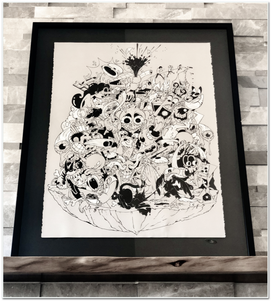 framed illustration of the artist&#039;s black-and-white illustration, &quot;A Feast for the Eyes&quot;