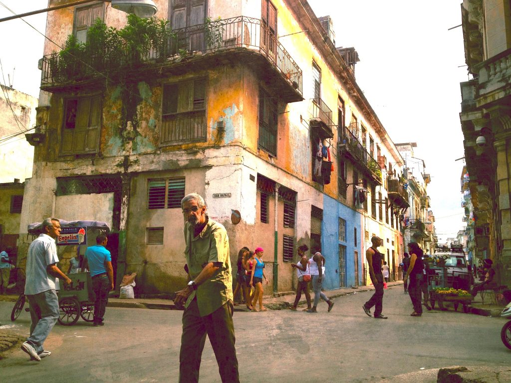 street scene in Havana, Cuba with a man in the foreground