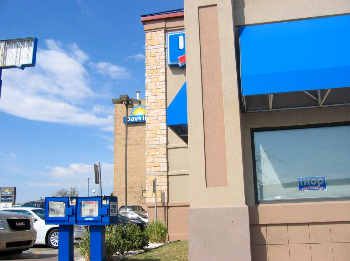 outdoor photograph of an IHOP (International House of Pancakes) and a Days Inn hotel in the background