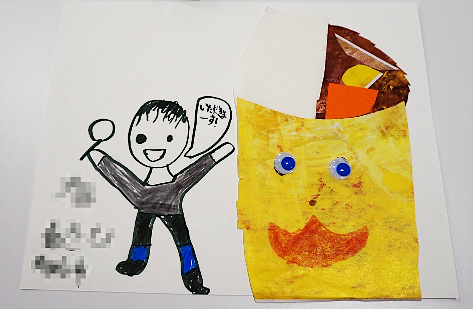 child&#039;s artwork with a figure of a boy and a bowl of Japanese curry