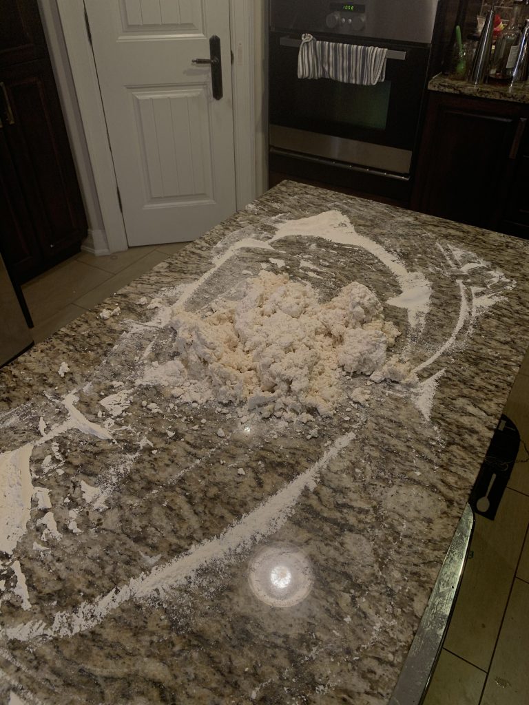 a kitchen island covered in flour