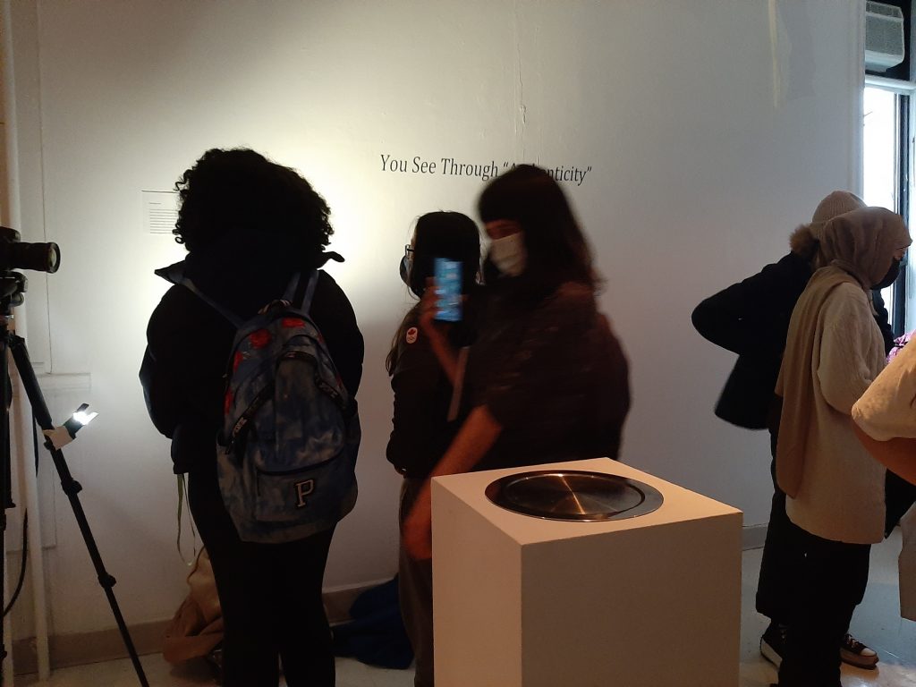 visitors in a gallery space