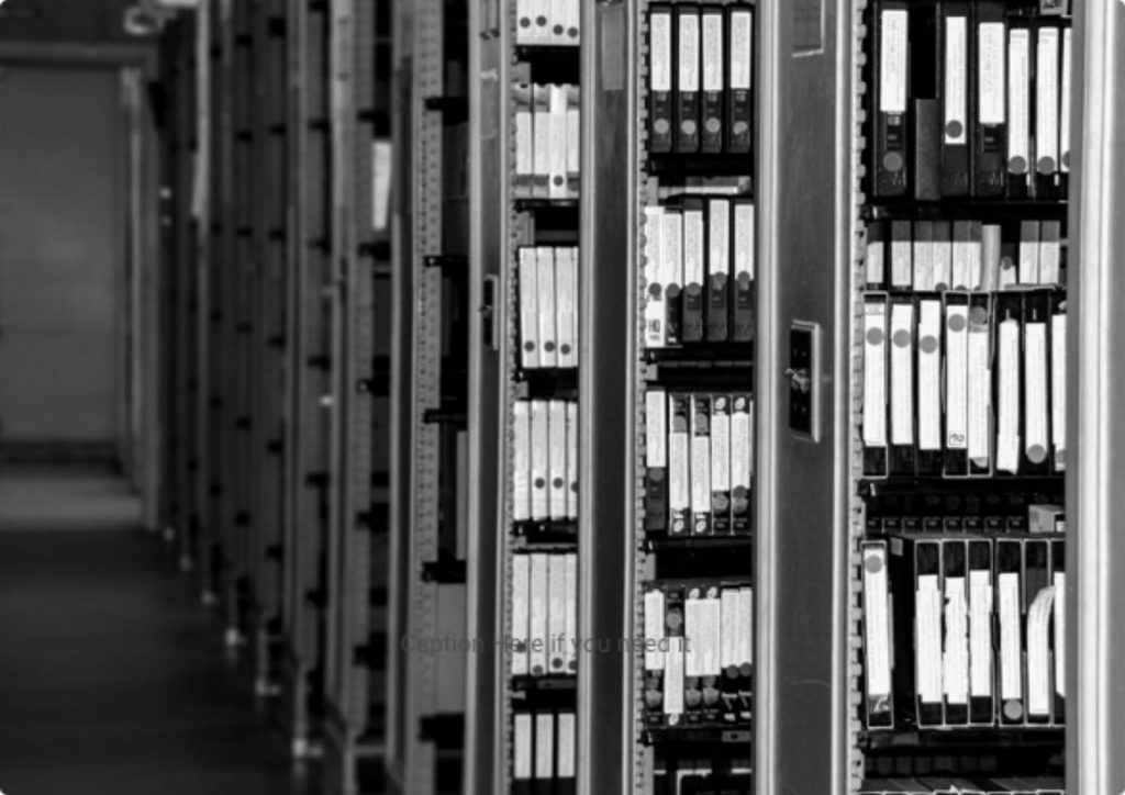 Black and white photo of VHS videos, Fortunoff Video Archive for Holocaust Testimonies, Yale.