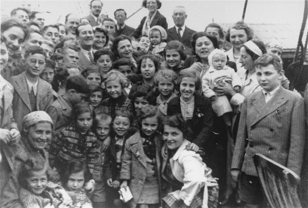 A black and white photograph of a crowd of people standing on the deck of the St. Louis.