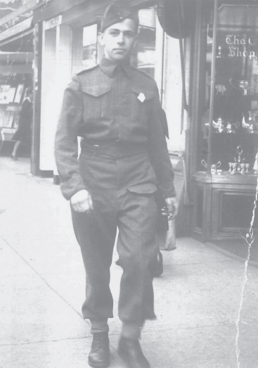 Josef Eisinger walking on Yonge Street in Toronto in uniform.