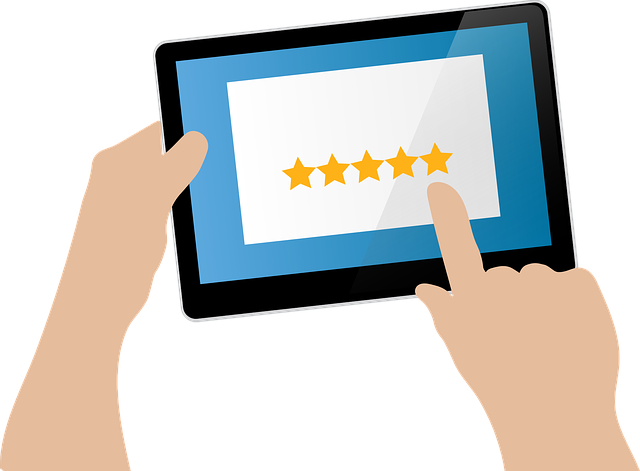 Graphic of hands holding tablet with 5 stars on the screen