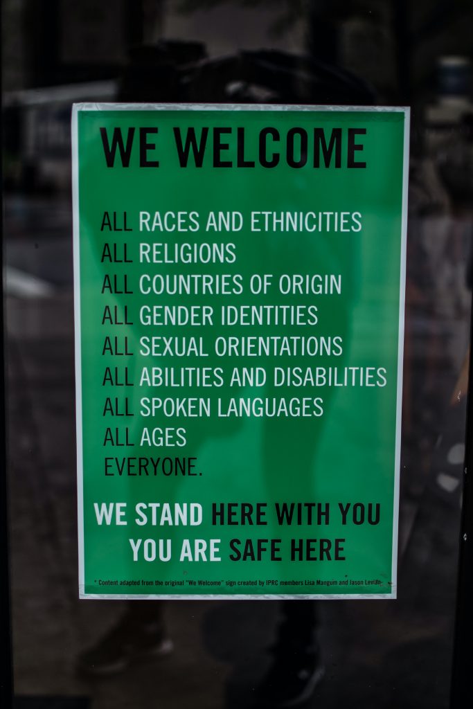 We Welcome poster with the text: We welcome: all races and ethnicities, all religions, all countries of origin, all gender identities, all sexual orientations, all abilities and disabilities, all spoken languages, all ages, everyone. We stand here with you. You are safe here.