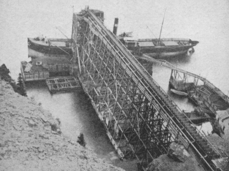 Conveyor belt buit on scaffolding at dock.