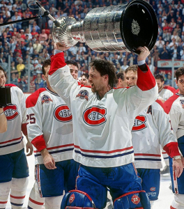 Hockey player holding up the Stanley cup