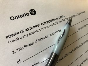Blank paper form with Government of Ontario logo and pen.