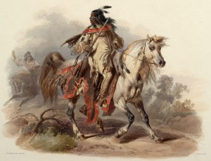 A Blackfoot warrior carrying a spear rides a white horse.