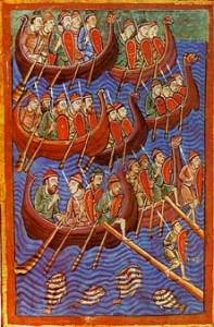 Six rowboats with men holding shields and spears row across the water.