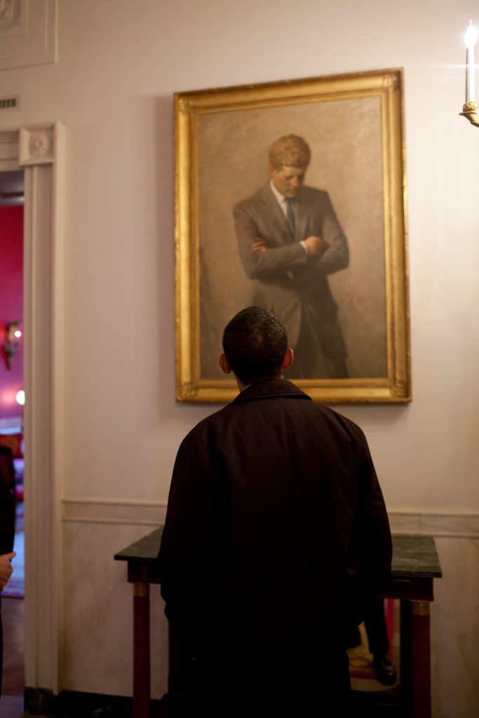 On a tour of the State Floor of the White House, President Barack Obama looks at a portrait of John F. Kennedy by Aaron Shikler, Jan. 24, 2009.