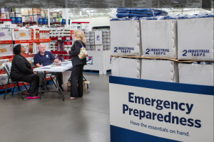 Photographs of a team working on emergency preparedness for Hurricane Sandy