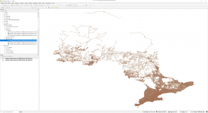 QGIS, with a shapefile representing all roads in Ontario, displayed as brown lines on a white background.