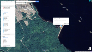 A google map showing the Ottawa river just south of the Canadian Nuclear Laboratories at Chalk River. On a large triangular sandbank there are several placemarkers and a description box with the text: "A large sand bank: possibly location. Camping place May 12th".