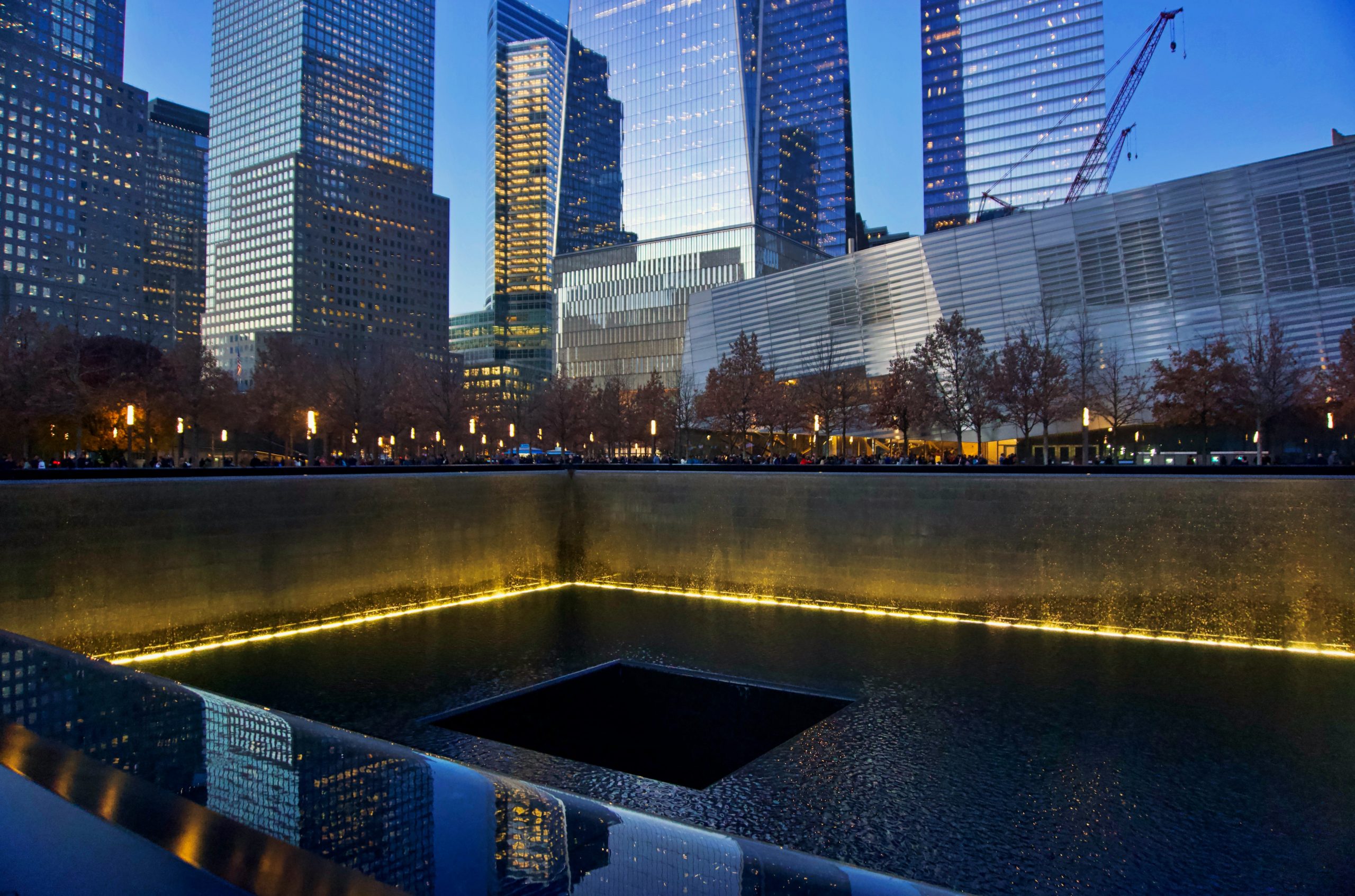 Reflecting fountain pool at the base of South Tower that re-circulates water on the pool's walls. 